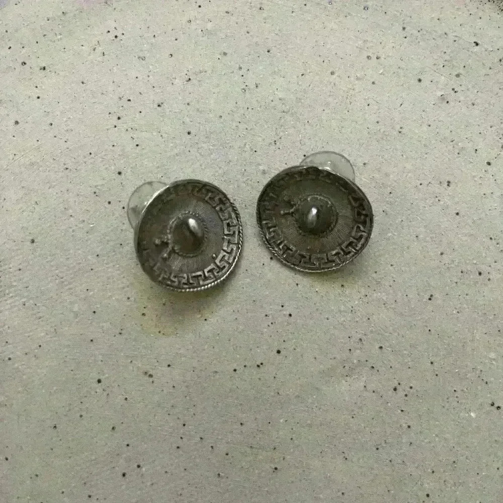 Stealing silver antique sombrero earrings